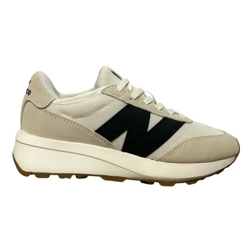 TÊNIS 370V1 NEW BALANCE BEGE/PRETO